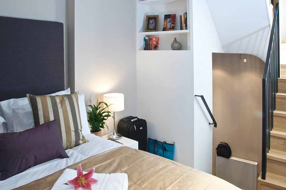Deluxe One Bedroom Apartment - Bedroom 